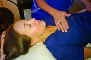 Woman receiving specialized healing treatment 