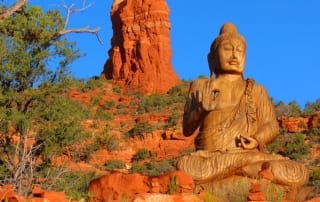 The Buddha and Chimney Rock look out over Sedona Stupa