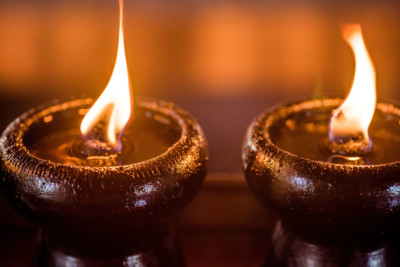 Two small bowl with a flame in each-Couples Retreats