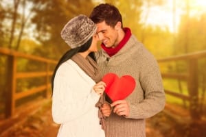 Couple holding a red heart Sedona Retreats