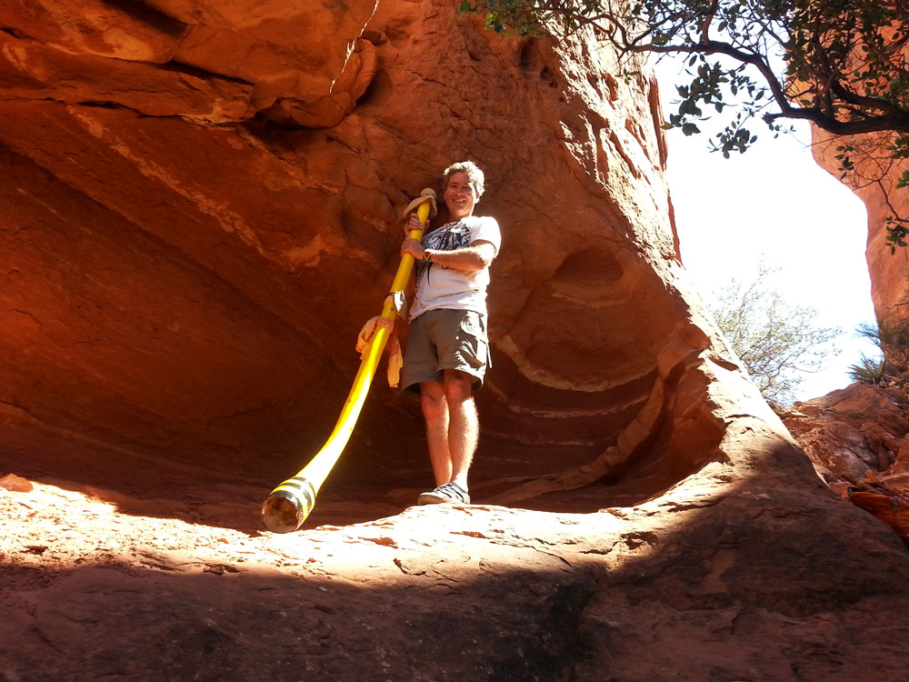 Guide Playing the Digeridoo while in a Vortex in Sedona, AZ