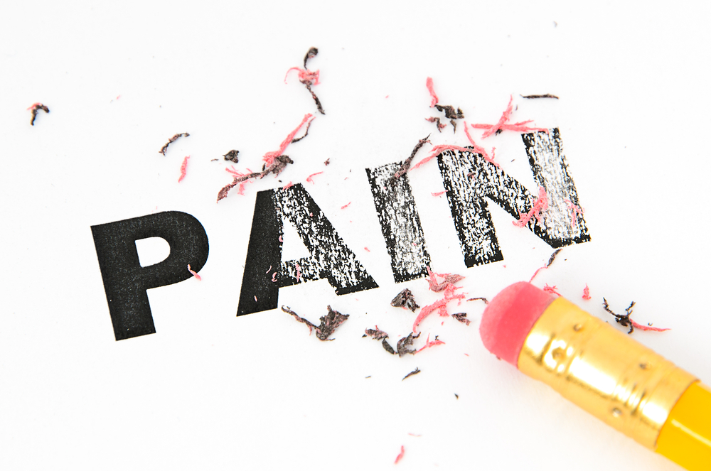 Breaking Old Belief Patterns Releases Pain The word PAIN being erased with a pencil eraser-Spiritual Treatment