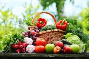 Brown wicker basket overflowing with fruits and vegetables-stress management
