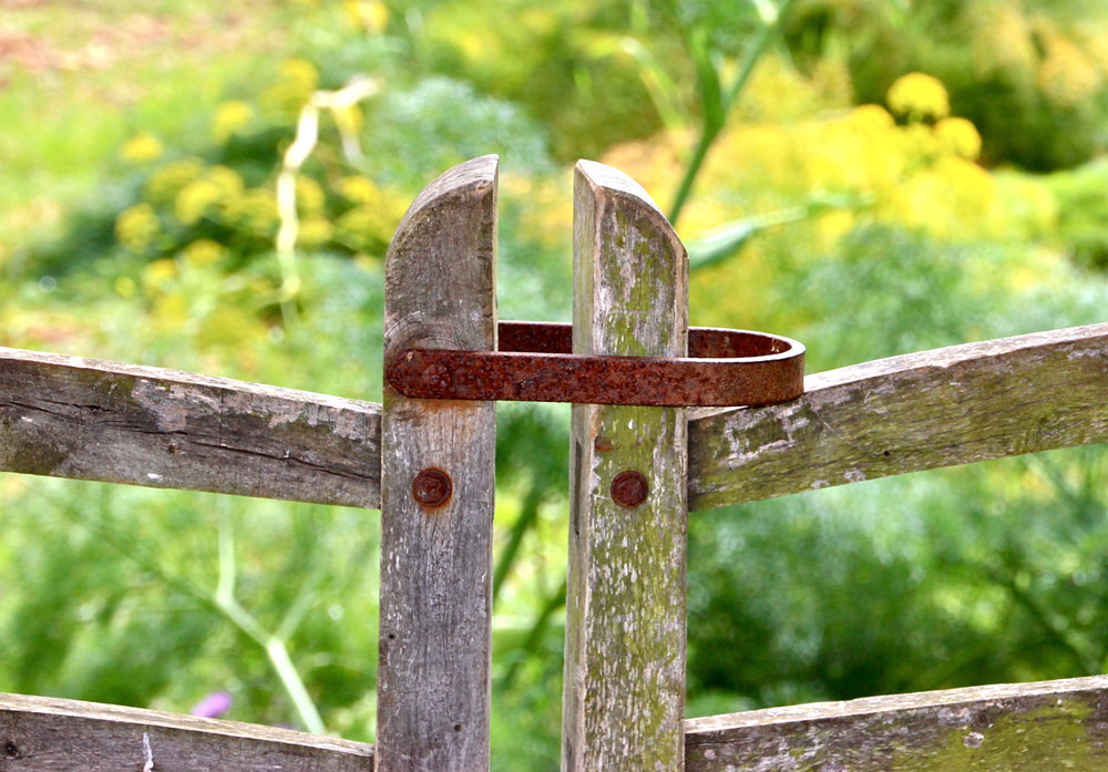 A fence gate latched close-SpiritQuest Sedona