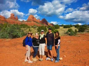 SpiritQuest Sedona Retreats owner Katherine Lash out on the land with clients during a retreat