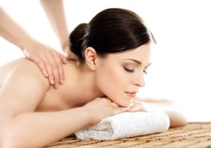 Woman laying her head on a towel during a massage-Swedish Massage-SpritQuest 