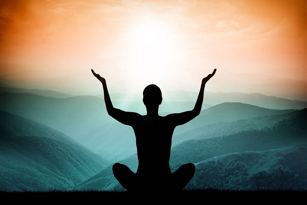 Person Meditating for Spiritual Empowerment