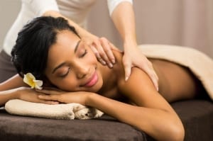 Woman getting an Ultimate Massage treatment- Spa Weekend Getaway