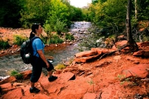 Woman hiking in Oak Creek Canyon-SpiritQuest Sedona Retreats