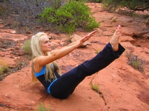 Woman Doing a yoga pose in nature-Yoga and Meditation Retreats
