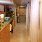 SpiritQuest Sedona Retreats retreat center hallway with hardwood floor and curtains