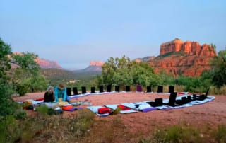 A circles of yoga chairs on the red rocks of Sedona-Yoga Retreat