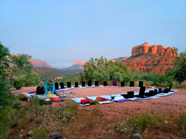 A circles of yoga chairs on the red rocks of Sedona-Yoga Retreat