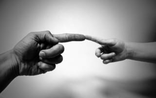 hands touching for inner child healing retreat
