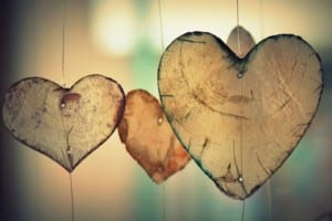 Three hearts hanging from strings-life after covid