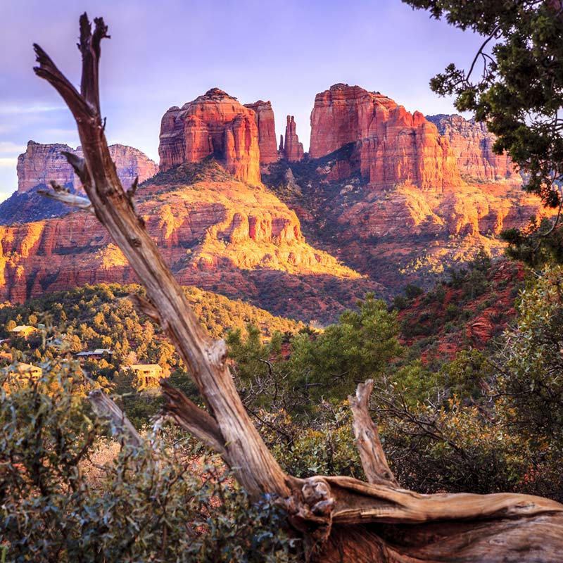 a scenic view of the Sedona red rock formations during golden hour sunset