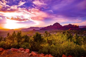 sunset over sedona red rocks SpiritQuest Sedona Retreats featured image for reclaiming your spirit and holistic healing integration.