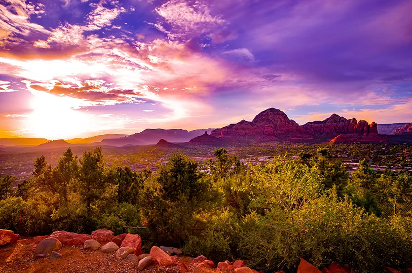 sunset over sedona red rocks SpiritQuest Sedona Retreats featured image for reclaiming your spirit and holistic healing integration.