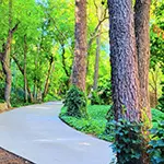 Gated driveway entrance to our private 1.5-acre lush green retreat property in Sedona.