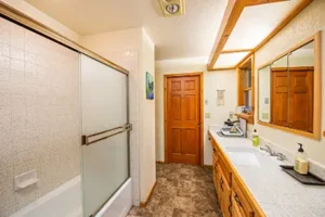 Clean, modern private bathroom in the Owl Wisdom suite at our Sedona retreat sanctuary.
