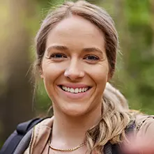 danielle-headshot Danielle, a spiritquest client smiles into the camera during a wellness retreat.