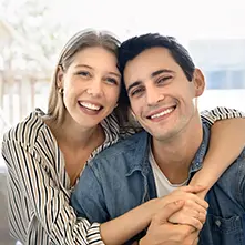 Dennis and Taylor embrace during a couples retreat with spiritquest