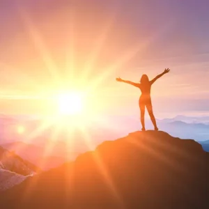 joy-light-wellness-sessions (1) Woman experiencing a spiritual reset at a SpiritQuest Sedona wellness retreat during sunrise.