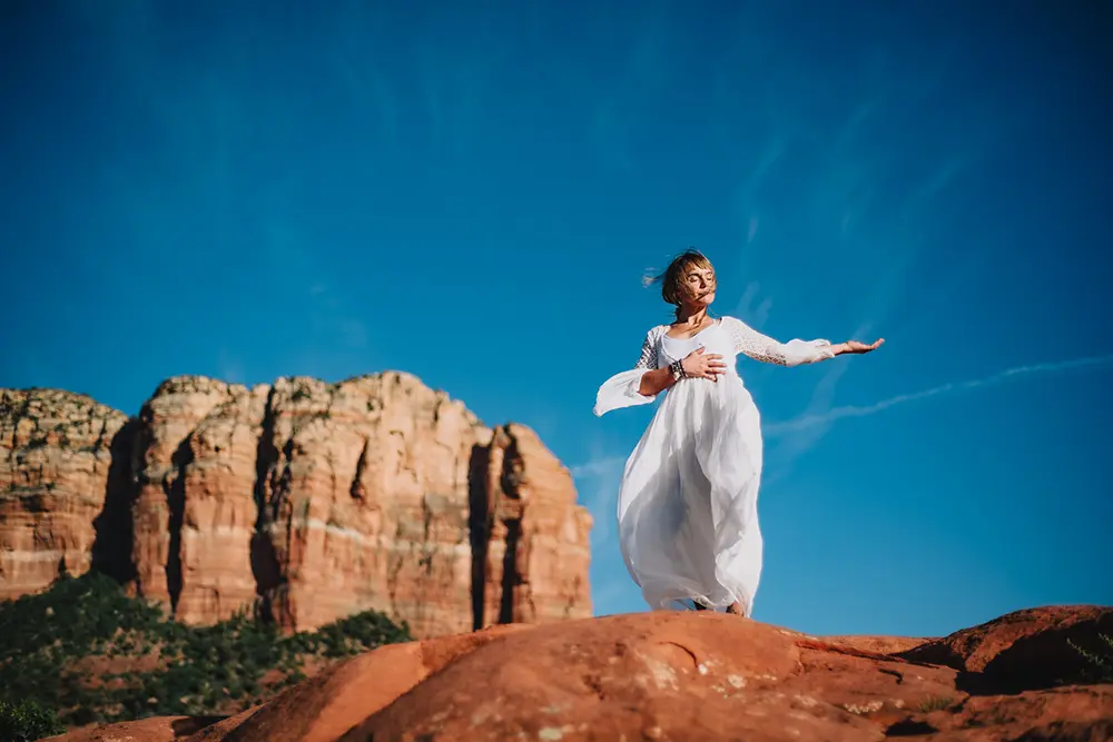 spiritual-woman-sedona-retreat-packages2 A client experiencing personal transformation during a SpiritQuest Sedona retreat.