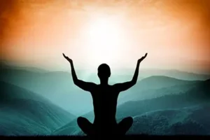 An individual experiencing a peaceful emotional release and spiritual healing session on the Sedona red rocks.