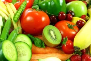An assortment of fresh, vibrant fruits and vegetables representing holistic nutrition during a wellness retreat.