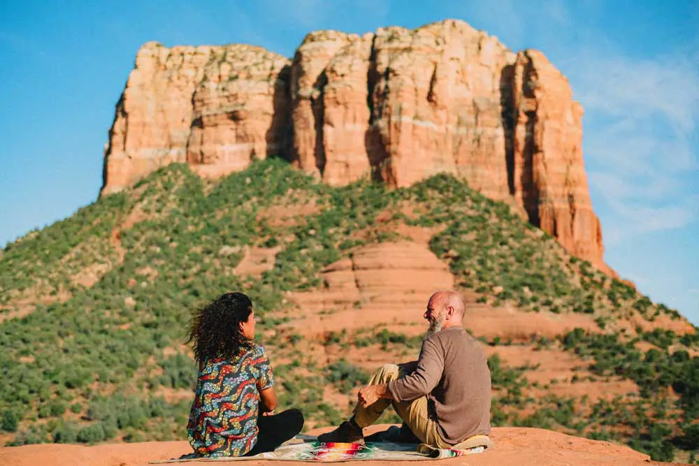 two-men-at-vortex-sedona Two men in sitting at a vortex talking in Sedona.